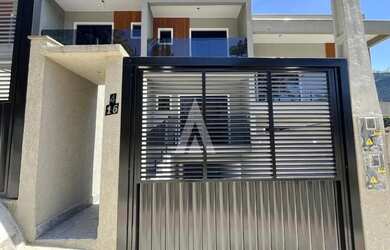 Imagem: A casa possui 2 Dormitórios, 3 Banheiros, 1 Vaga na garagem