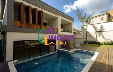 Imagem: A casa em condomínio possui 5 Dormitórios, 5 Banheiros, 5