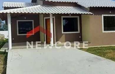 Imagem: A casa possui 3 Dormitórios, 2 Banheiros, 4 Vagas na garagem