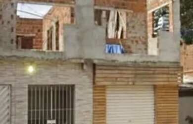 Imagem: A casa possui 2 Dormitórios, 2 Banheiros e está localizado