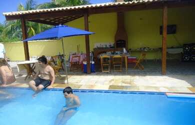 Imagem: A casa possui 3 Dormitórios, 4 Vagas na garagem e está localizado