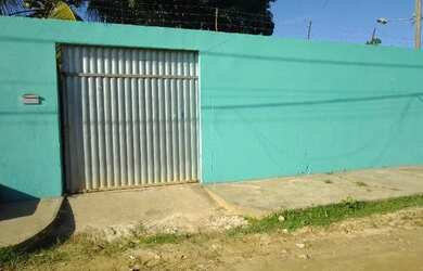 Imagem: A casa possui 2 Dormitórios, 2 Banheiros e 5 Vagas na garagem