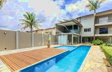 Imagem: A casa possui 3 Dormitórios, 5 Banheiros, 5 Vagas na garagem