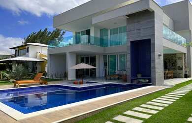 Imagem: A casa em condomínio possui 5 Dormitórios, 5 Banheiros, 5