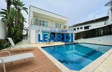 Imagem: A casa em condomínio possui 5 Dormitórios, 1 Banheiro, 5 Vagas