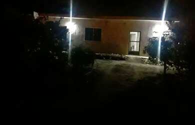 Imagem: A casa possui 2 Dormitórios, 2 Banheiros, 4 Vagas na garagem