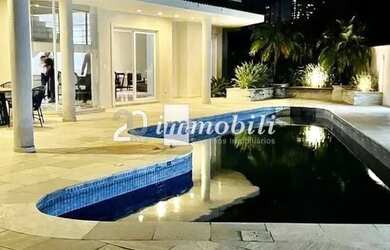 Imagem: A casa em condomínio possui 4 Dormitórios, 5 Banheiros, 5