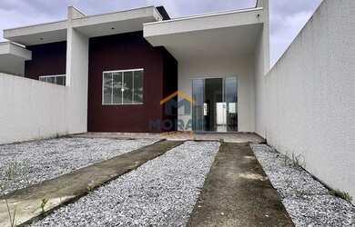 Imagem: A casa possui 3 Dormitórios, 2 Banheiros, 1 Vaga na garagem