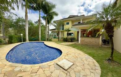 Imagem: A casa em condomínio possui 4 Dormitórios, 5 Banheiros, 5