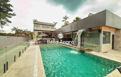 Imagem: A casa possui 5 Dormitórios, 5 Banheiros, 2 Vagas na garagem