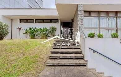 Imagem: A casa possui 4 Dormitórios, 5 Banheiros, 5 Vagas na garagem