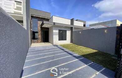 Imagem: A casa possui 3 Dormitórios, 3 Banheiros, 2 Vagas na garagem