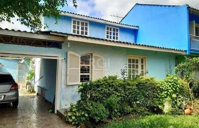 Imagem: A casa possui 3 Dormitórios, 1 Banheiro, 3 Vagas na garagem