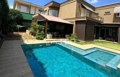 Imagem: A casa em condomínio possui 4 Dormitórios, 5 Banheiros, 5