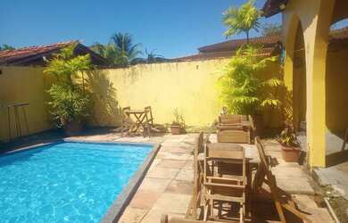 Imagem: A casa possui 3 Dormitórios, 2 Banheiros, 3 Vagas na garagem