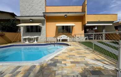 Imagem: A casa em condomínio possui 3 Dormitórios, 3 Banheiros, 5