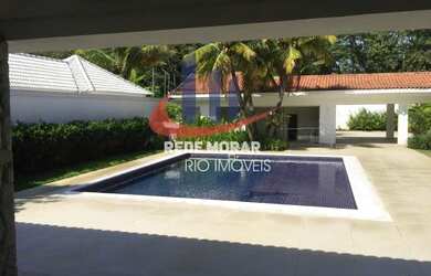 Imagem: A casa em condomínio possui 5 Dormitórios, 5 Banheiros, 5