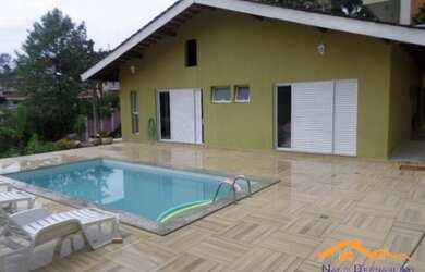 Imagem: A casa em condomínio possui 2 Dormitórios, 5 Banheiros, 4