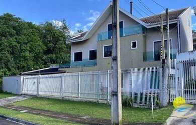 Imagem: A casa possui 3 Dormitórios, 4 Banheiros, 4 Vagas na garagem