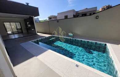 Imagem: A casa em condomínio possui 3 Dormitórios, 4 Banheiros, 3