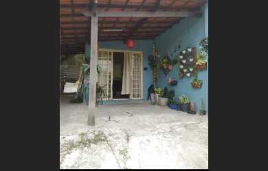 Imagem: A casa possui 3 Dormitórios, 2 Banheiros, 3 Vagas na garagem