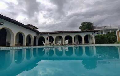 Imagem: A casa possui 3 Dormitórios, 5 Banheiros, 5 Vagas na garagem