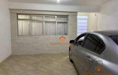 Imagem: A casa possui 4 Dormitórios, 5 Banheiros, 2 Vagas na garagem