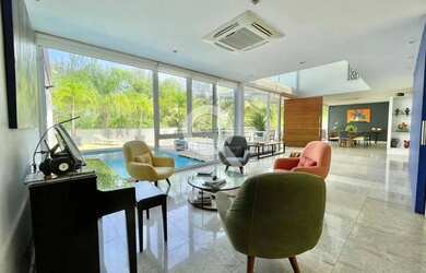 Imagem: A casa em condomínio possui 4 Dormitórios, 5 Banheiros, 4