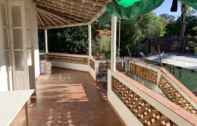 Imagem: A casa possui 4 Dormitórios, 2 Banheiros, 140m² de Área e