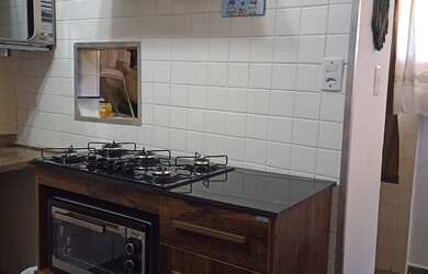 Imagem: A casa possui 2 Dormitórios, 1 Vaga na garagem e está localizado