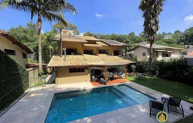 Imagem: A casa em condomínio possui 4 Dormitórios, 5 Banheiros, 4