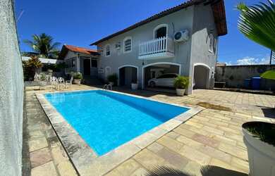 Imagem: A casa possui 3 Dormitórios, 4 Banheiros, 4 Vagas na garagem