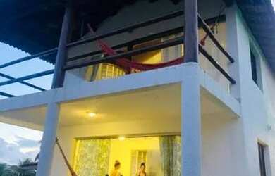 Imagem: A casa possui 3 Dormitórios, 3 Vagas na garagem e está localizado