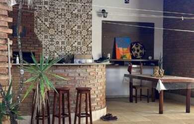 Imagem: A casa possui 3 Dormitórios, 5 Banheiros, 3 Vagas na garagem