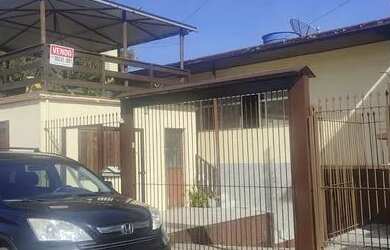 Imagem: A casa possui 5 Dormitórios, 3 Banheiros, 3 Vagas na garagem