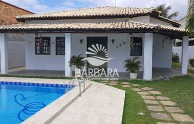 Imagem: A casa possui 4 Dormitórios, 5 Banheiros, 5 Vagas na garagem