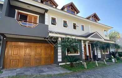 Imagem: A casa em condomínio possui 4 Dormitórios, 5 Banheiros, 4