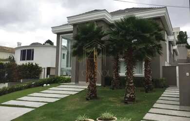 Imagem: A casa possui 5 Dormitórios, 5 Banheiros, 5 Vagas na garagem