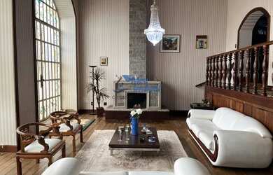 Imagem: A casa possui 4 Dormitórios, 5 Banheiros, 5 Vagas na garagem