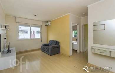 Imagem: O apartamento possui 2 Dormitórios, 1 Banheiro, 1 Vaga na garagem