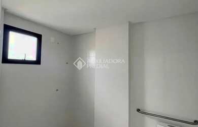 Imagem: O apartamento possui 1 Dormitório, 1 Banheiro, 1 Vaga na garagem