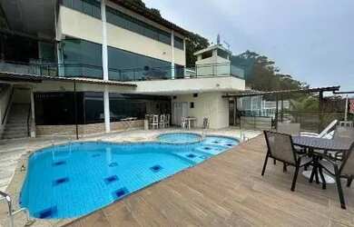 Imagem: A casa em condomínio à venda possui 5 Dormitórios, 5 Banheiros