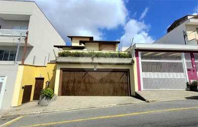 Imagem: A casa possui 3 Dormitórios, 5 Banheiros, 5 Vagas na garagem