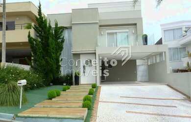 Imagem: A casa em condomínio possui 3 Dormitórios, 4 Banheiros, 4