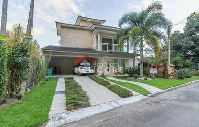 Imagem: A casa em condomínio possui 5 Dormitórios, 4 Banheiros, 4