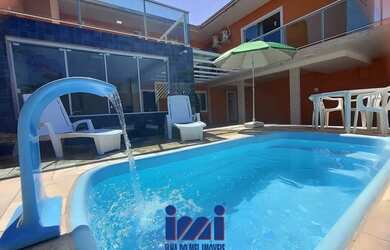 Imagem: A casa possui 3 Dormitórios, 5 Banheiros, 2 Vagas na garagem