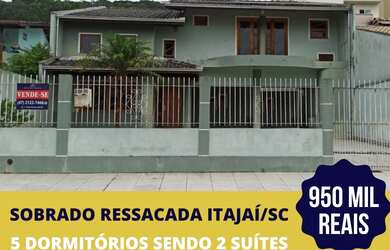 Imagem: A casa possui 5 Dormitórios, 4 Banheiros, 5 Vagas na garagem