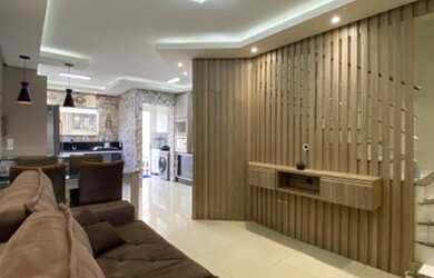 Imagem: A casa possui 2 Dormitórios, 3 Banheiros, 1 Vaga na garagem