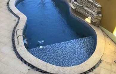 Imagem: A casa possui 5 Dormitórios, 5 Banheiros, 4 Vagas na garagem