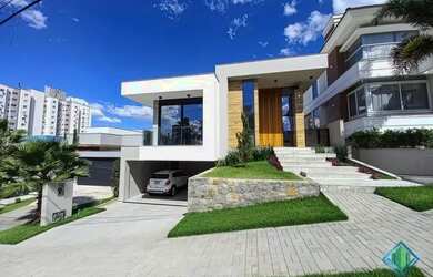 Imagem: A casa em condomínio possui 3 Dormitórios, 3 Banheiros, 4